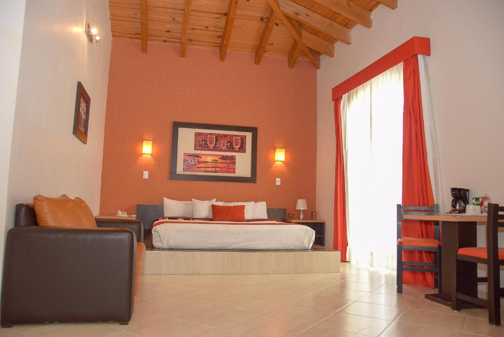 Postel nebo postele na pokoji v ubytování Hotel Real de TX