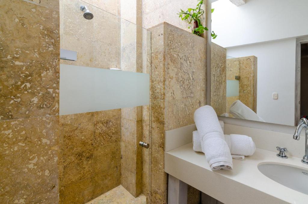 Een badkamer bij Casa Pizarro Hotel Boutique