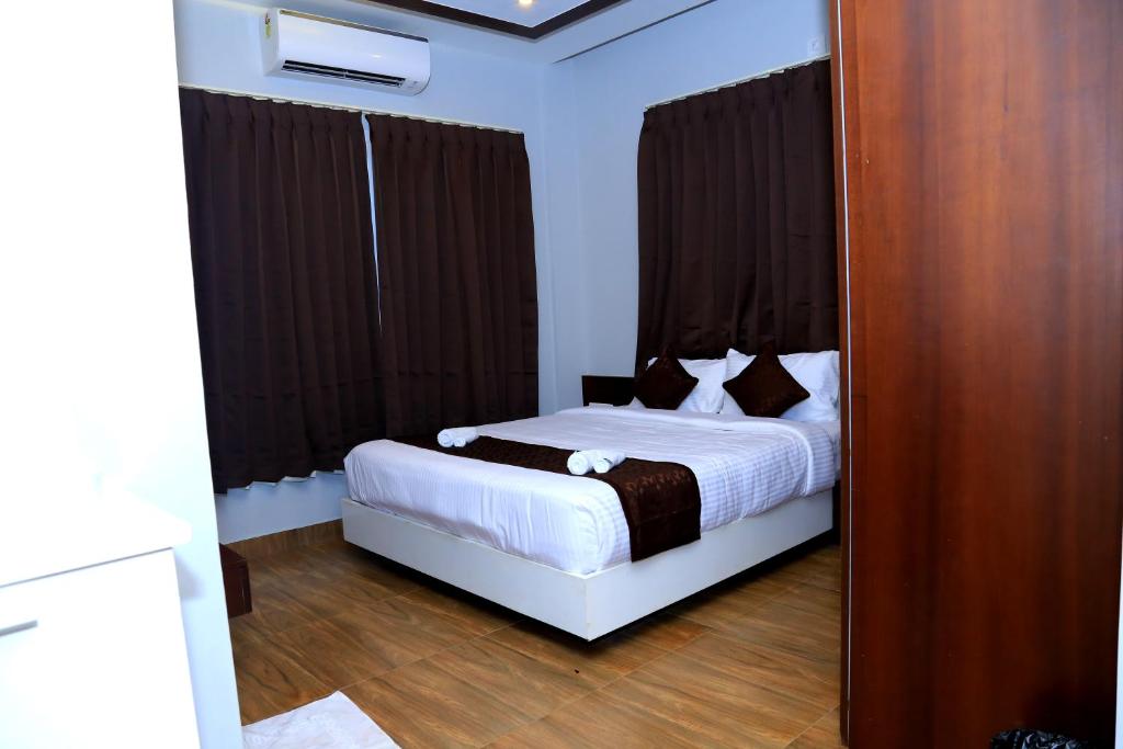 Postel nebo postele na pokoji v ubytování MAZUS INN