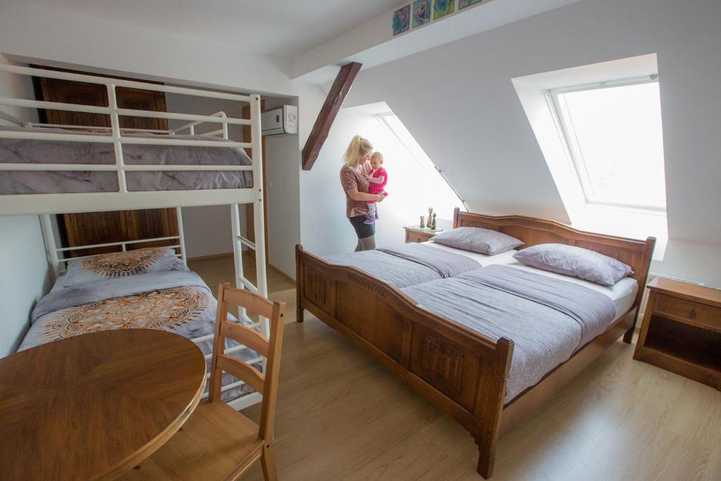 Postel nebo postele na pokoji v ubytování Hostel Sonce