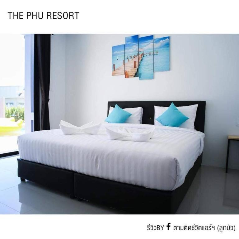 Postel nebo postele na pokoji v ubytování The Phu Resort