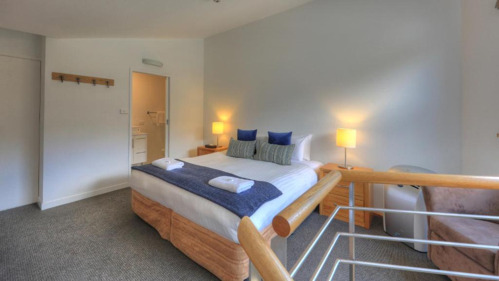 Postel nebo postele na pokoji v ubytování Snowgoose Apartments