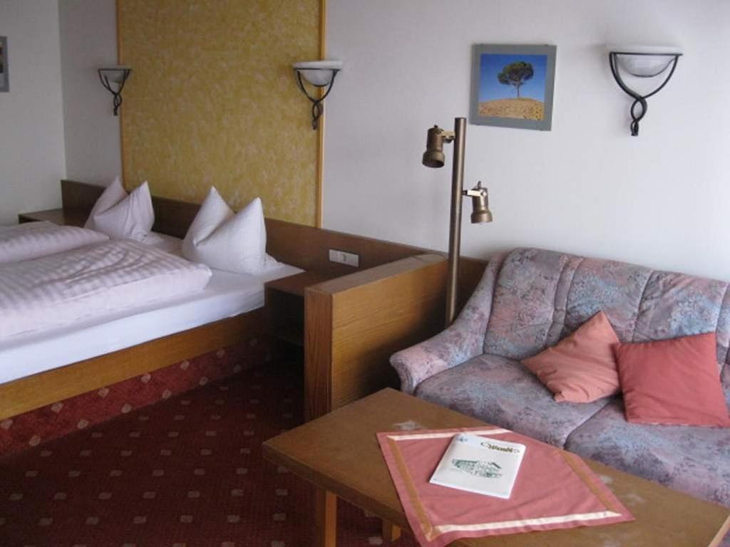 Postel nebo postele na pokoji v ubytování Hotel Bräukeller