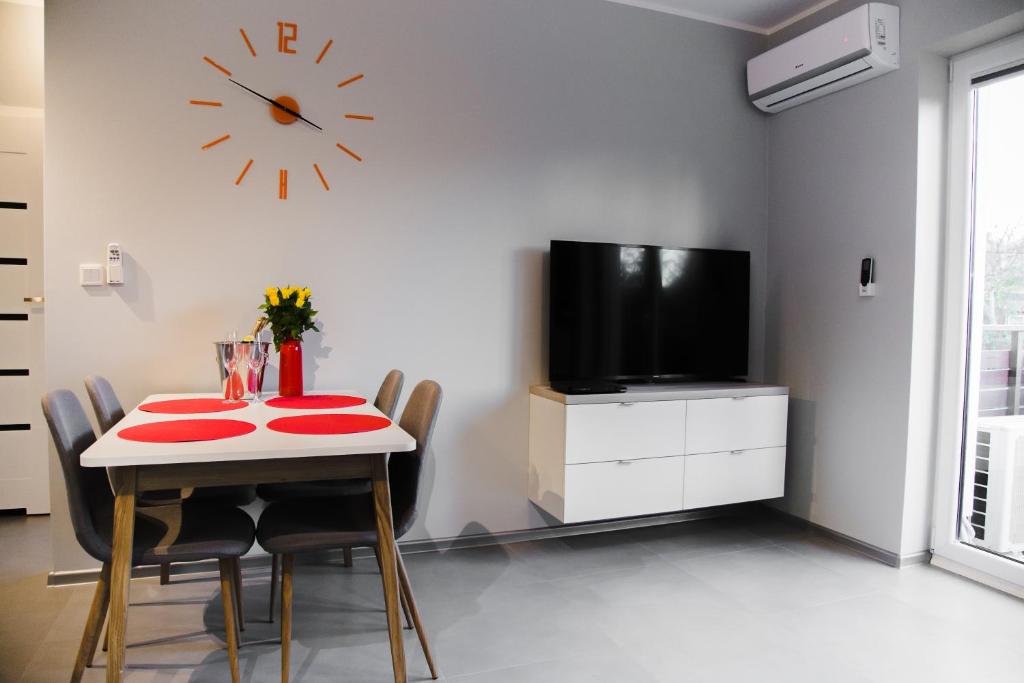 Televízia a/alebo spoločenská miestnosť v ubytovaní ULMA apartment