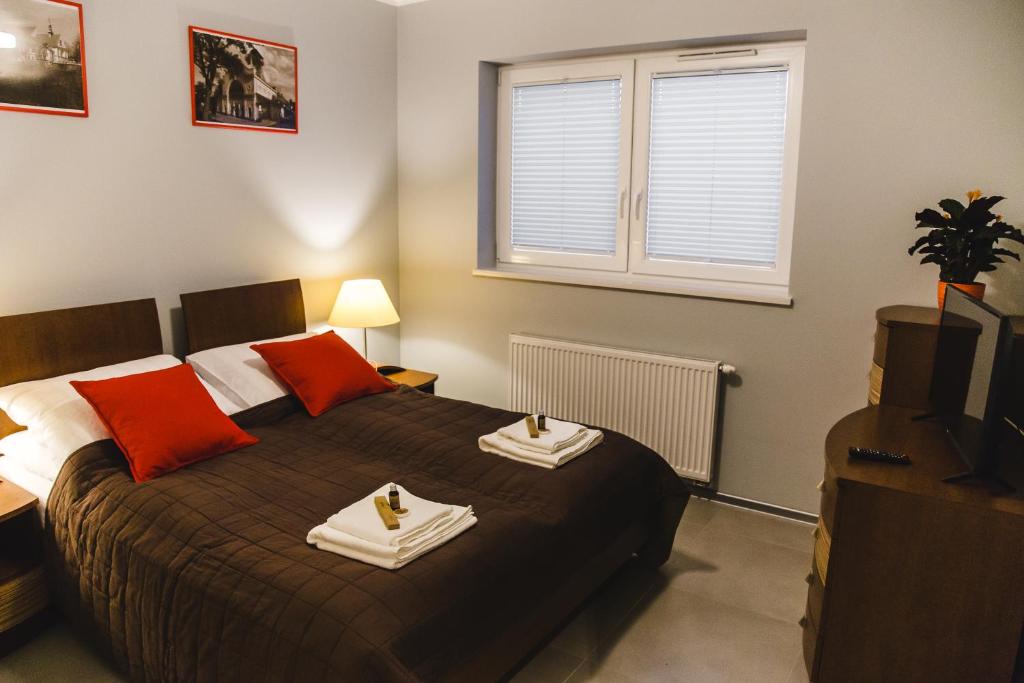 Posteľ alebo postele v izbe v ubytovaní ULMA apartment