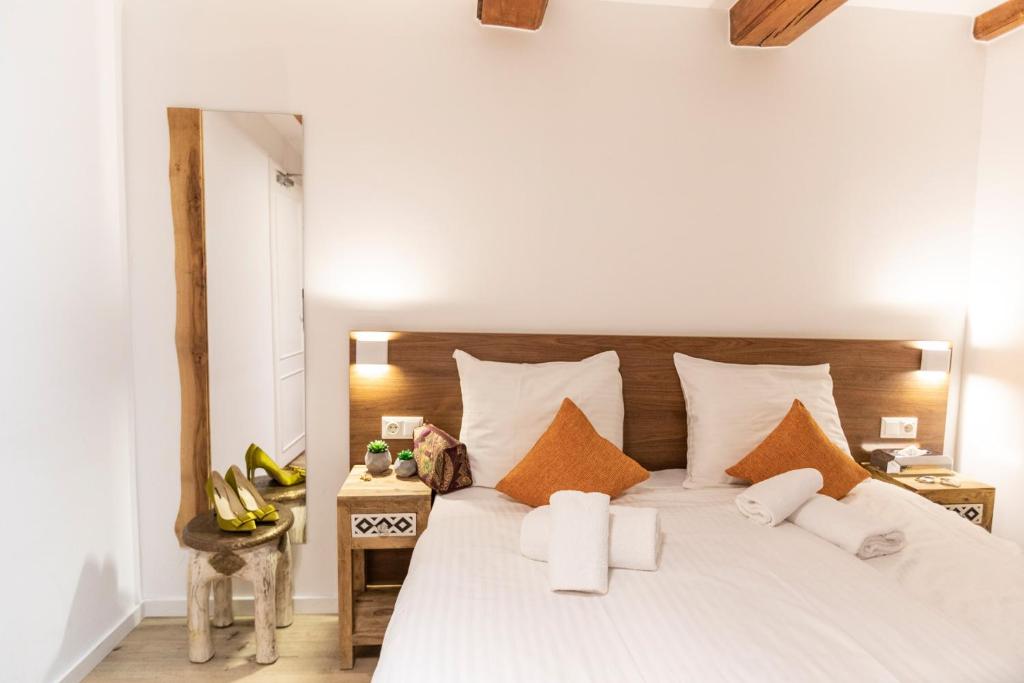Postel nebo postele na pokoji v ubytování Hotel Pagi