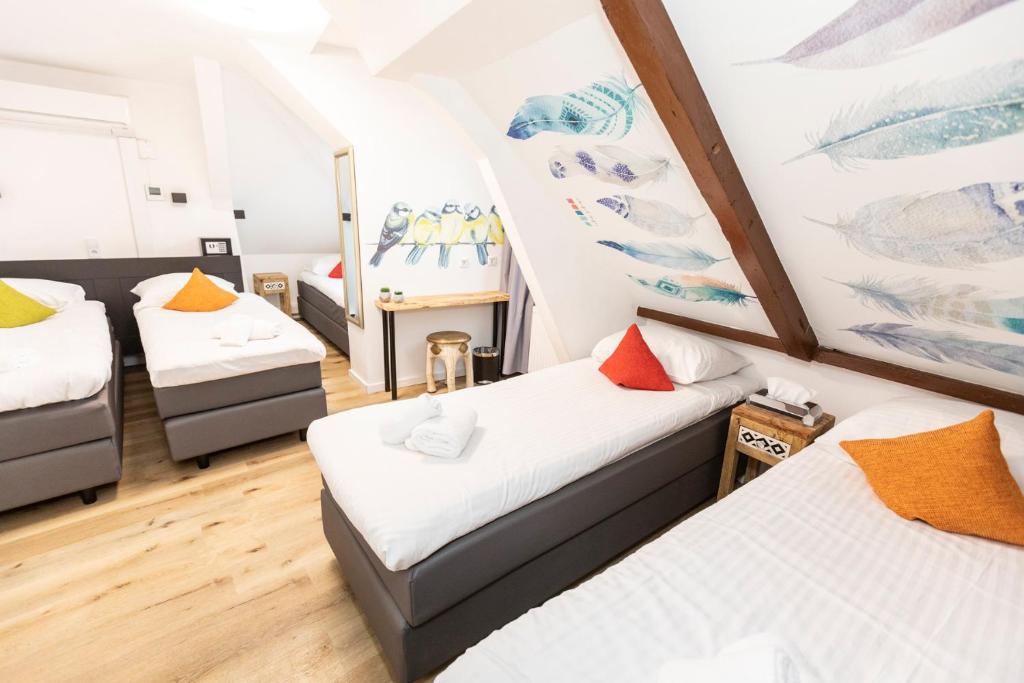 Postel nebo postele na pokoji v ubytování Hotel Pagi