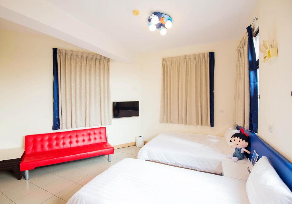 Postel nebo postele na pokoji v ubytování Happiness B&B