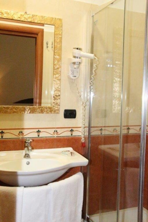 Koupelna v ubytování Hotel Mirage