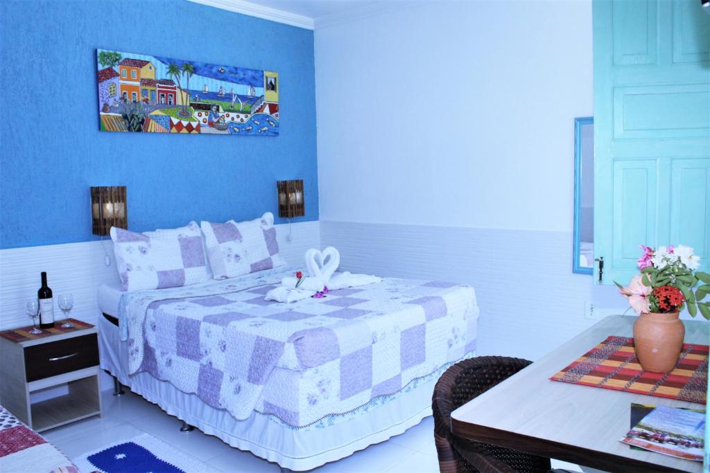 Cama ou camas em um quarto em Porto Bahia Hotel