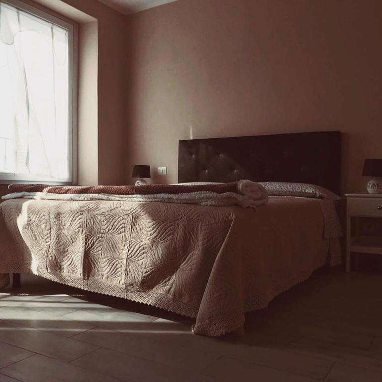 Postel nebo postele na pokoji v ubytování 700enolocanda