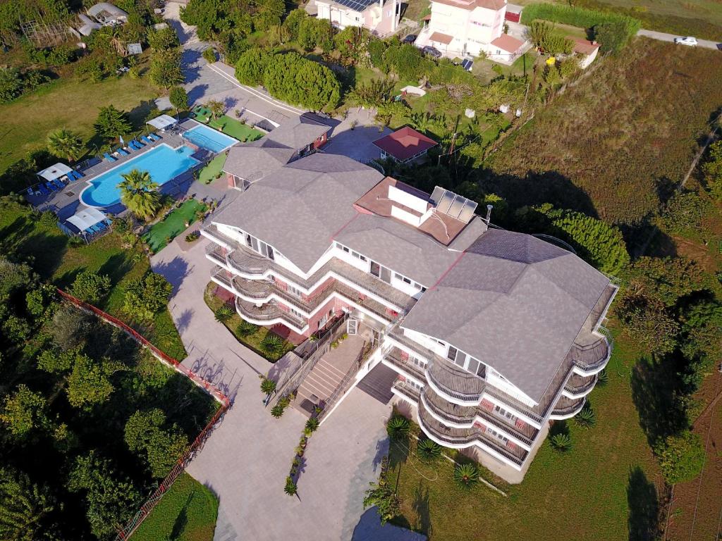 an aerial view of a large building with a pool at Ionion Star Hotel in Preveza