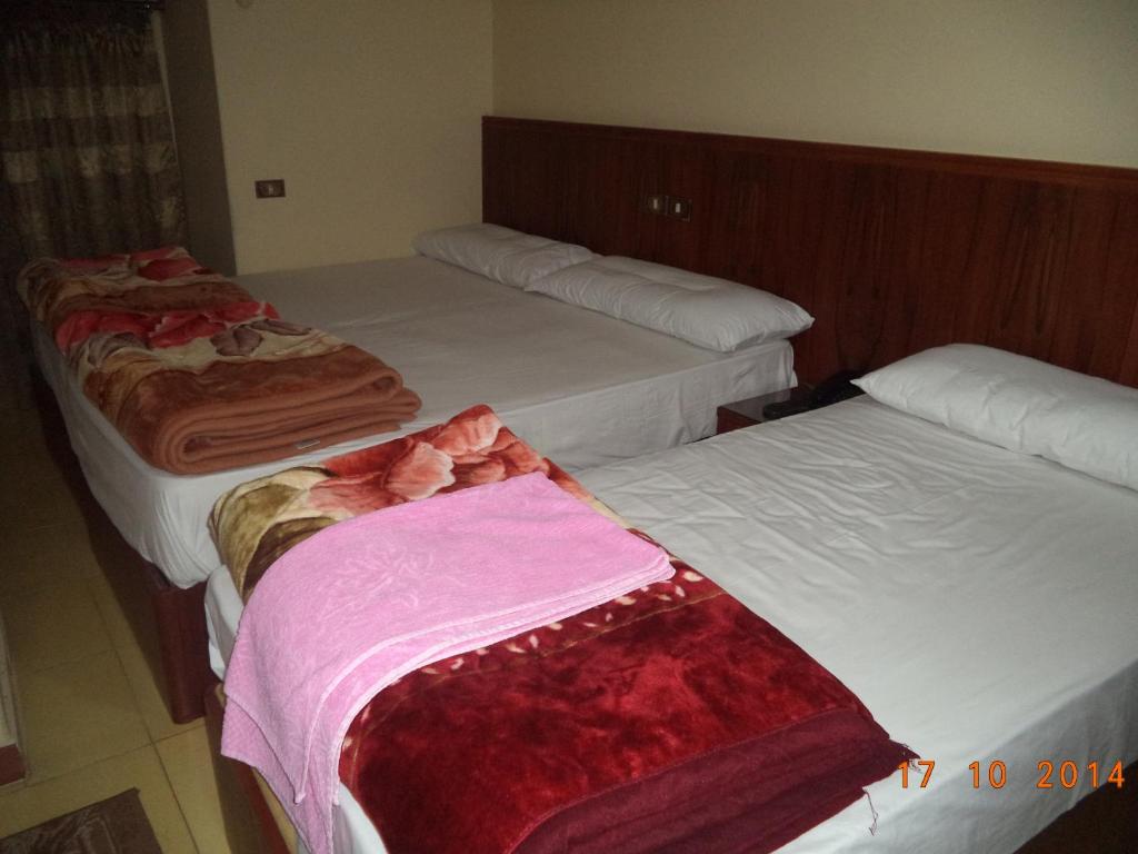 Al Maghraby Hotel - Quadruple Chambre