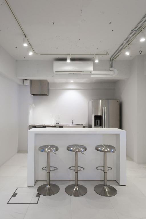 Kuchyň nebo kuchyňský kout v ubytování TSUKIMI HOTEL
