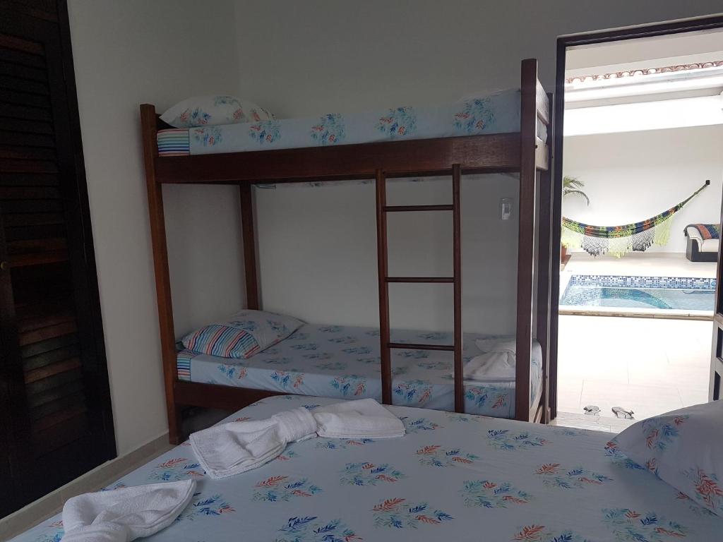  MANSÃO FRENTE A PRAIA - Locação de suítes com área de lazer compartilhada