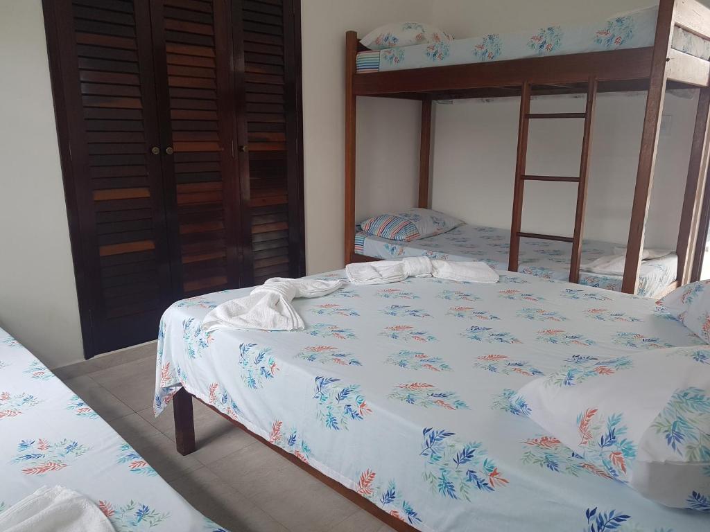  MANSÃO FRENTE A PRAIA - Locação de suítes com área de lazer compartilhada