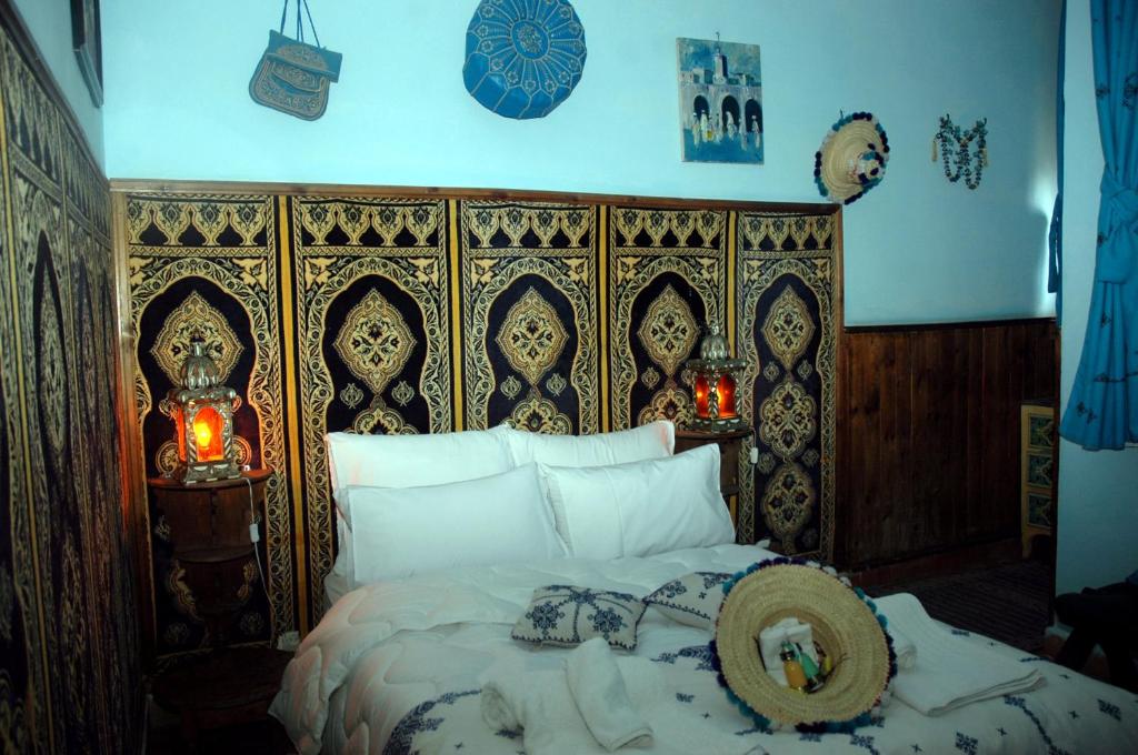 Postel nebo postele na pokoji v ubytování Riad Lahboul