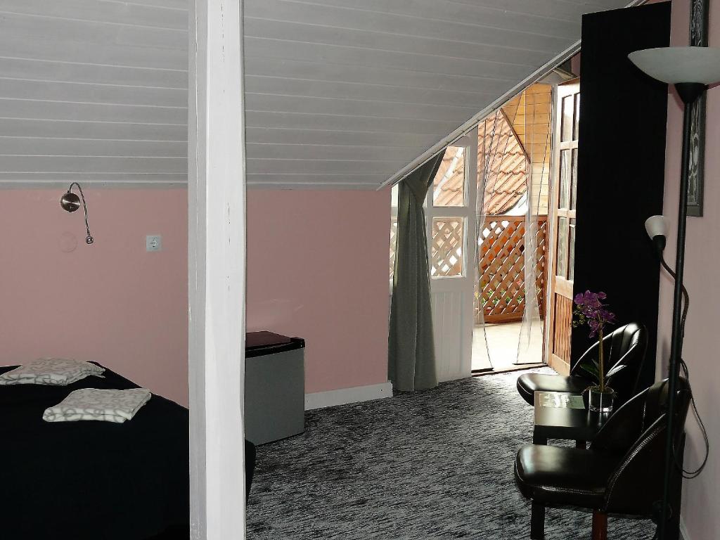 Posteľ alebo postele v izbe v ubytovaní Familia Apartman 304