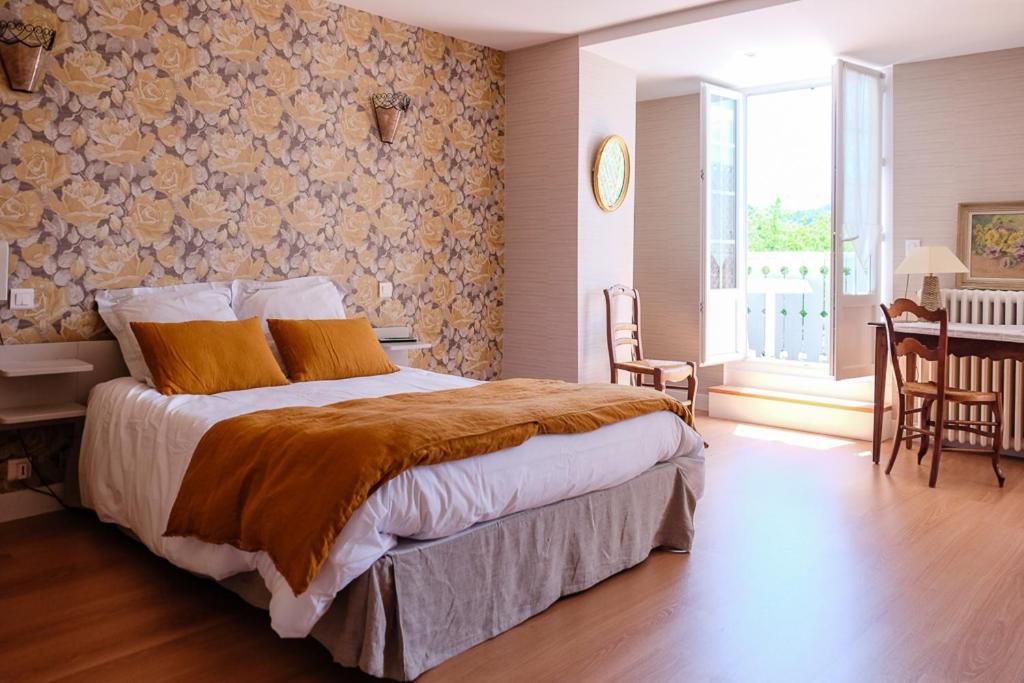 Postel nebo postele na pokoji v ubytování hôtel Piellenia