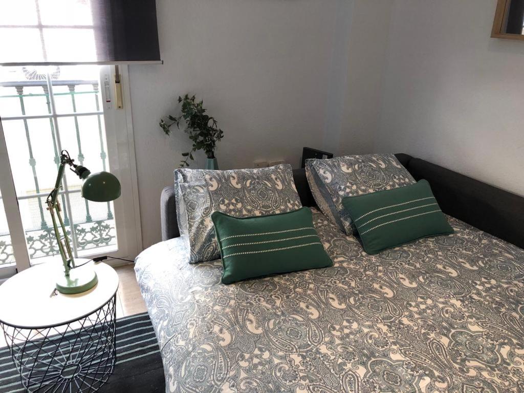 Postel nebo postele na pokoji v ubytování Charming Loft Málaga Centre