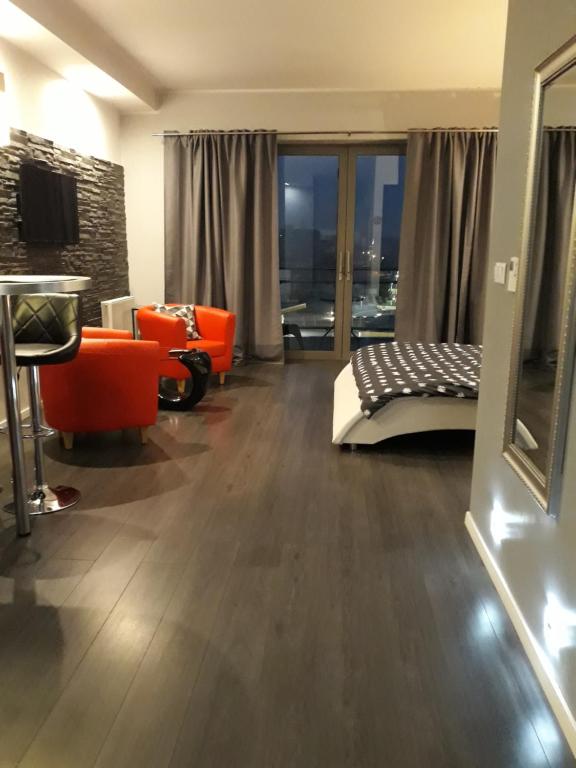 Posteľ alebo postele v izbe v ubytovaní Apartament Onyx