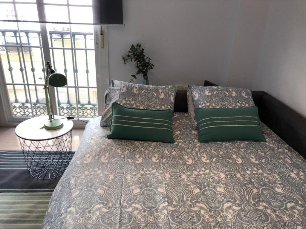 Postel nebo postele na pokoji v ubytování Charming Loft Málaga Centre