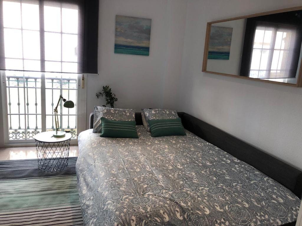 Postel nebo postele na pokoji v ubytování Charming Loft Málaga Centre