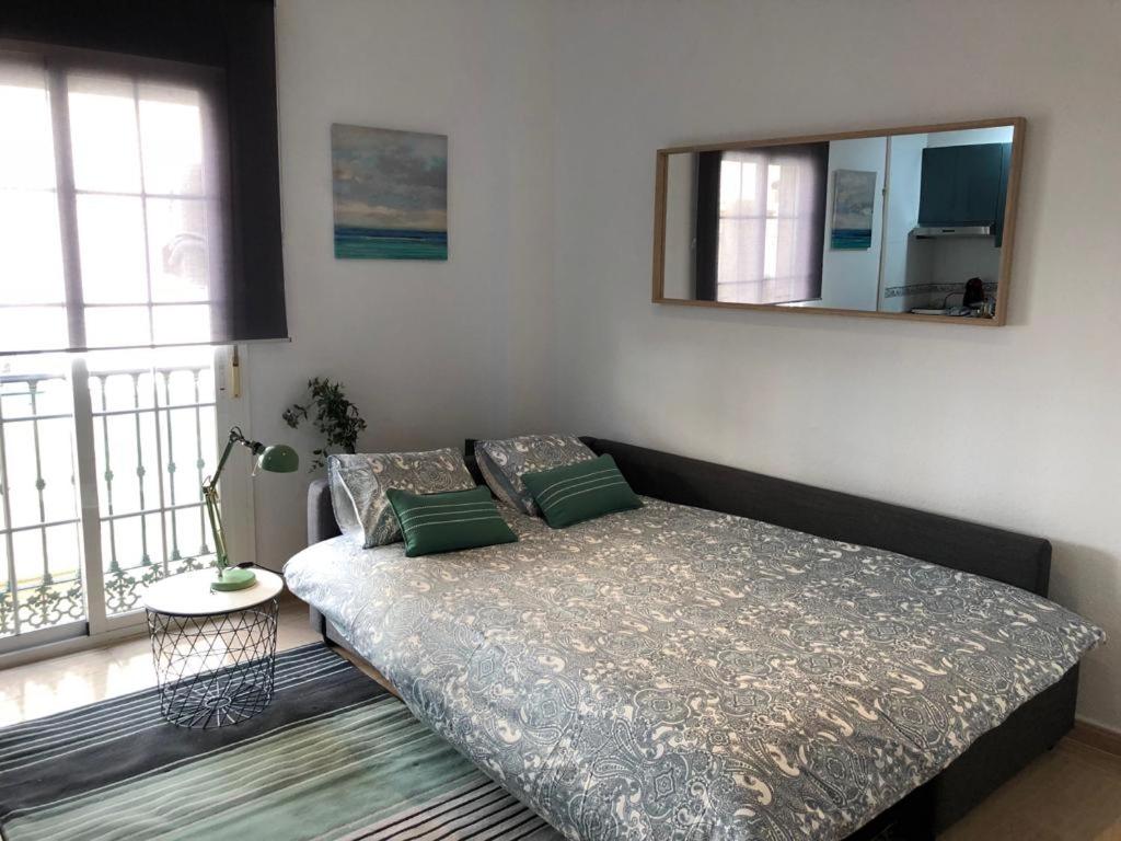 Postel nebo postele na pokoji v ubytování Charming Loft Málaga Centre