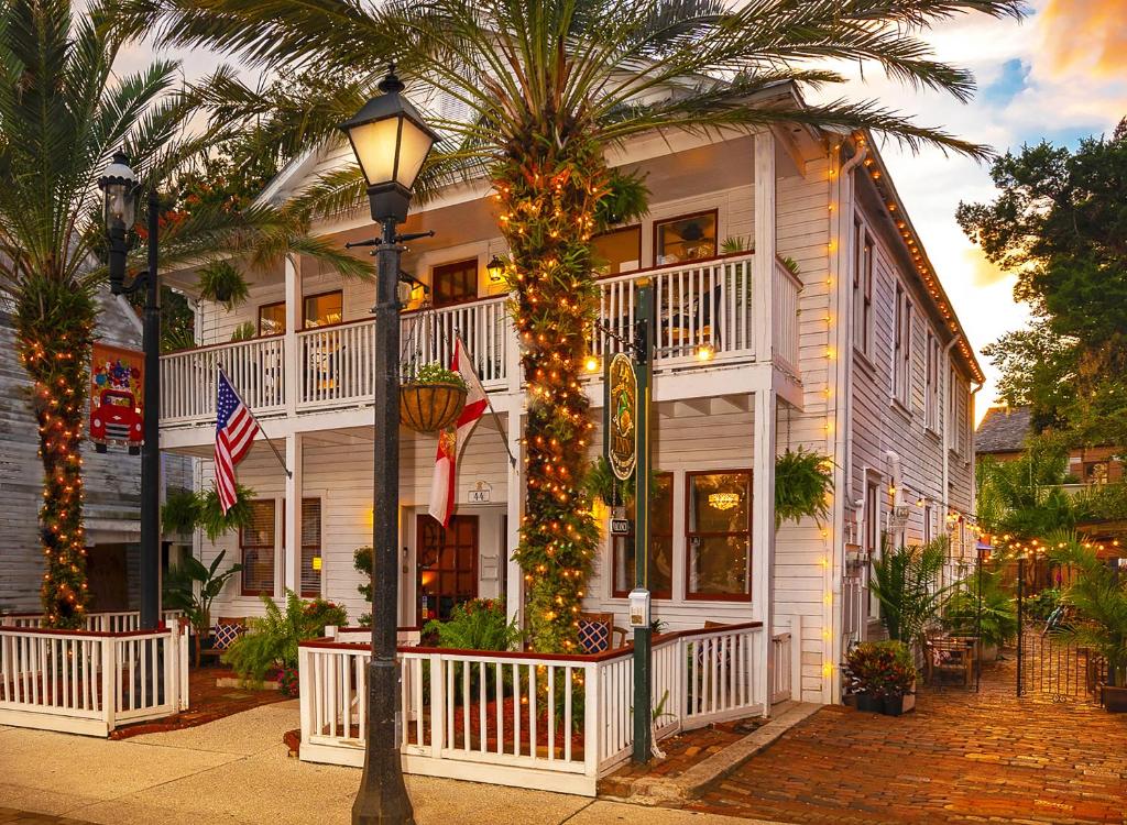 a house that has a tree in front of it at 44 Spanish Street Inn (Adults only) in St. Augustine