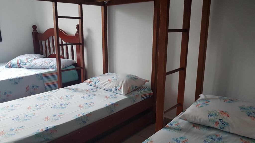  MANSÃO FRENTE A PRAIA - Locação de suítes com área de lazer compartilhada