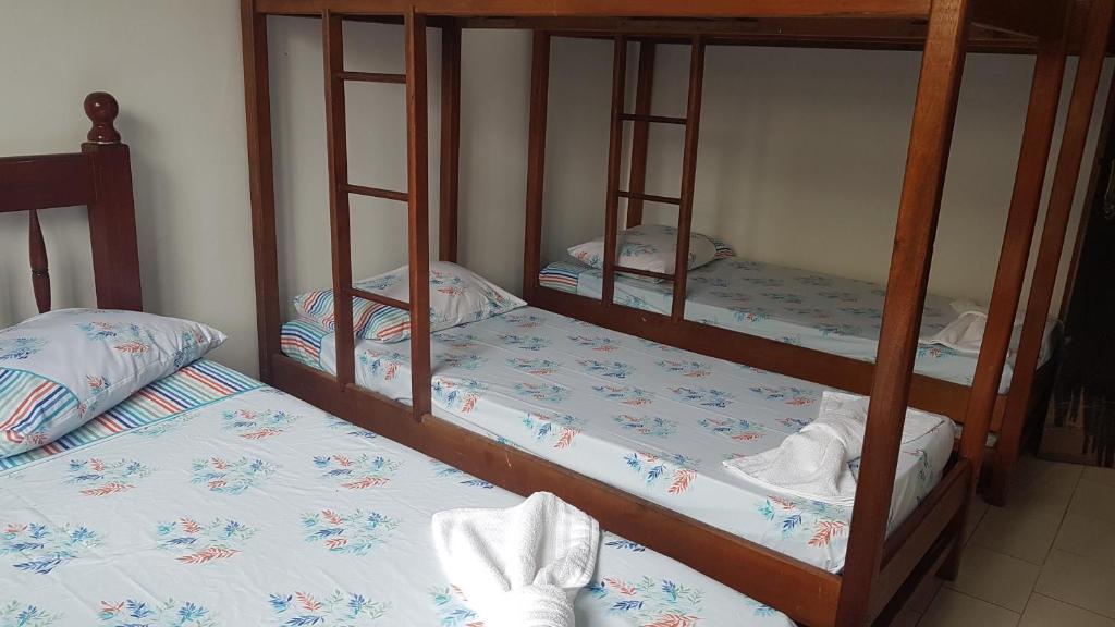  MANSÃO FRENTE A PRAIA - Locação de suítes com área de lazer compartilhada