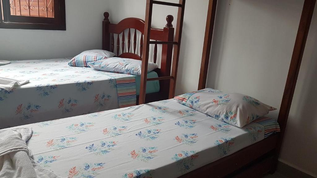  MANSÃO FRENTE A PRAIA - Locação de suítes com área de lazer compartilhada