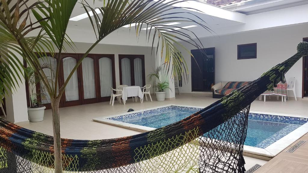  MANSÃO FRENTE A PRAIA - Locação de suítes com área de lazer compartilhada