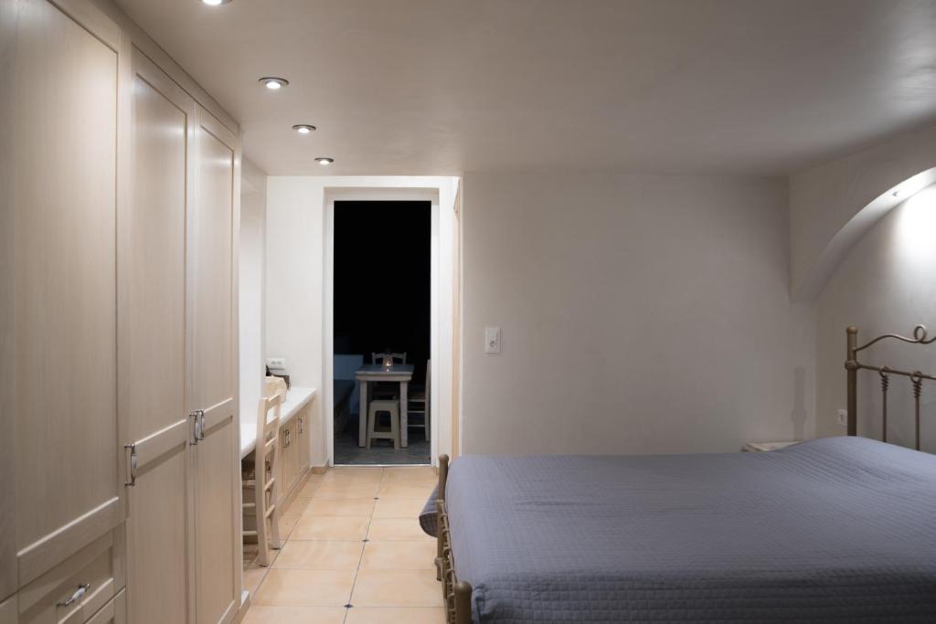 Posteľ alebo postele v izbe v ubytovaní Kathara Bay Apartments