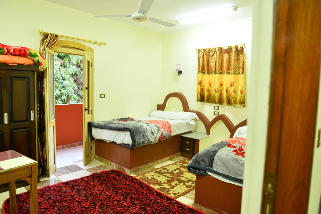 Postel nebo postele na pokoji v ubytování El Prince Guesthouse