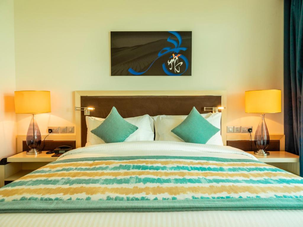 Postel nebo postele na pokoji v ubytování Retaj Salwa Resort & Spa