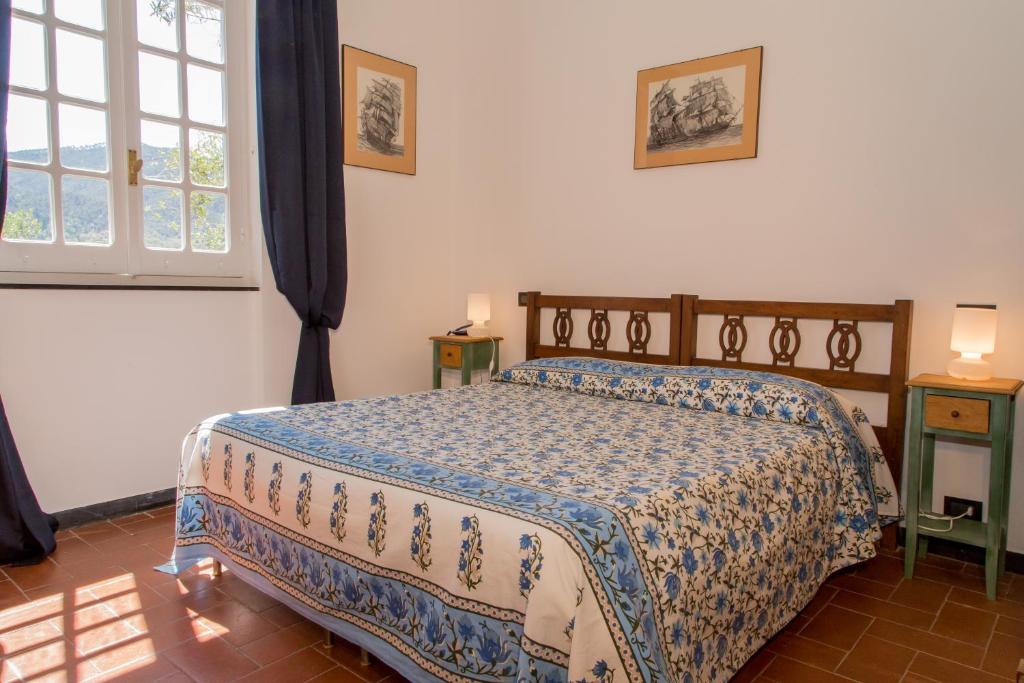 Postel nebo postele na pokoji v ubytování L' Amandola