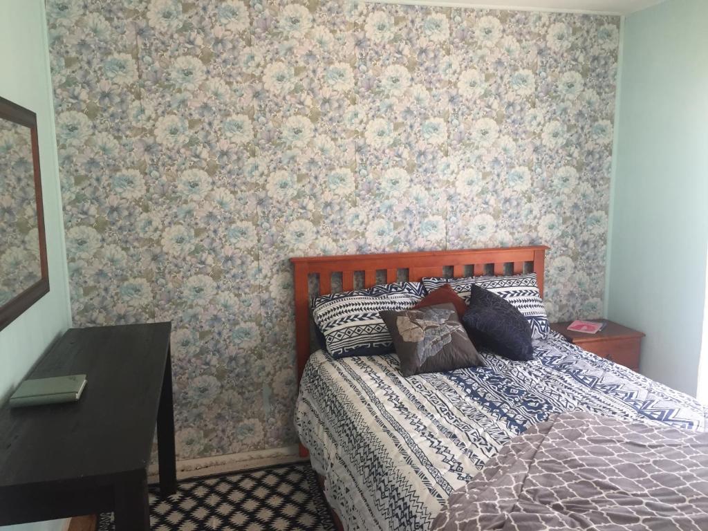 Postel nebo postele na pokoji v ubytování Grampians Nest