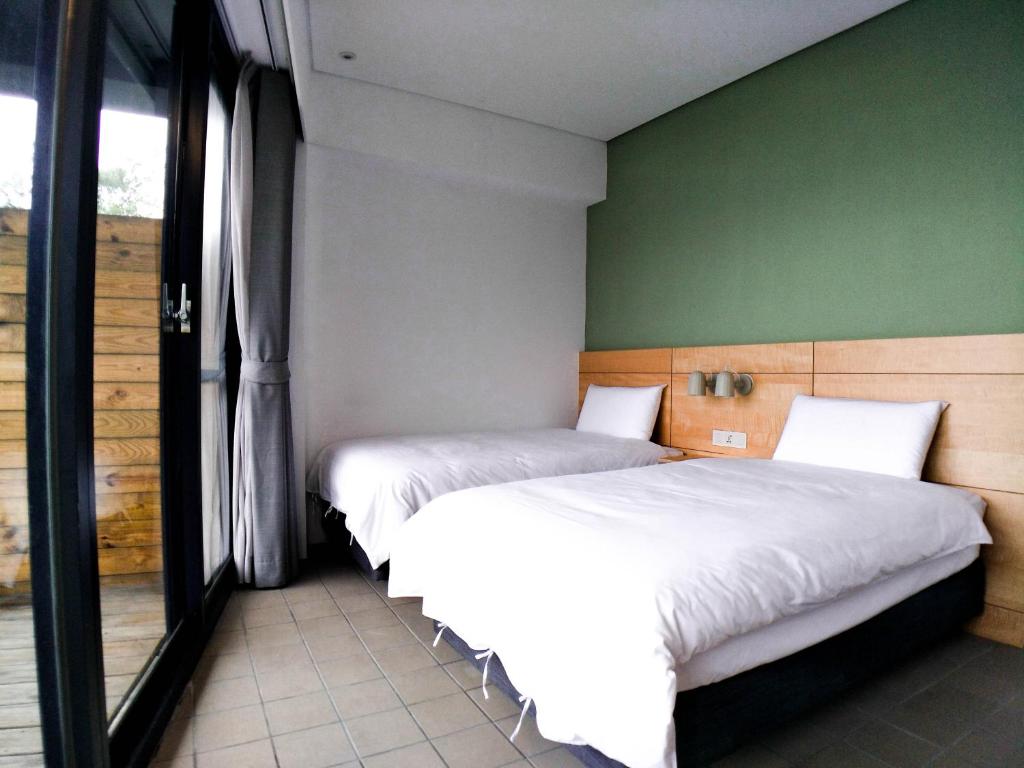 Postel nebo postele na pokoji v ubytování Dayspring Inn