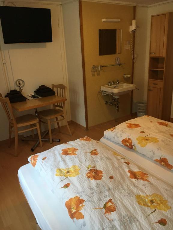 Postel nebo postele na pokoji v ubytování Hotel Restaurant Raben