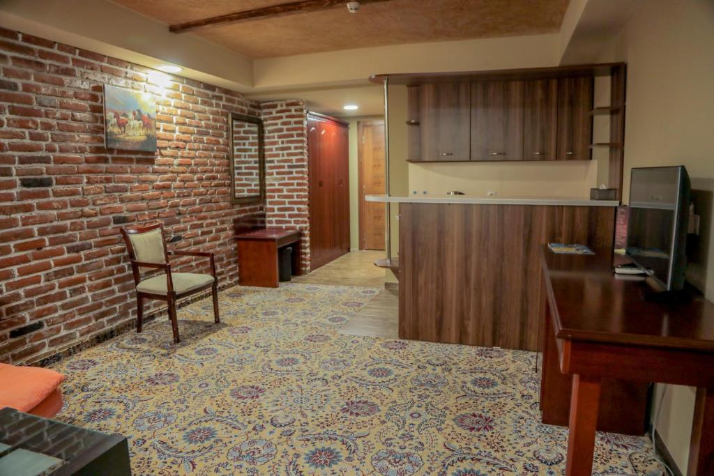 Kuchyň nebo kuchyňský kout v ubytování Borjomi Palace Health & Spa Center