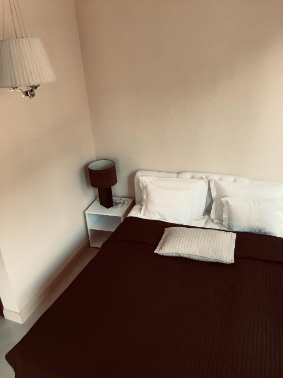 Postel nebo postele na pokoji v ubytování Hotel Ankavi