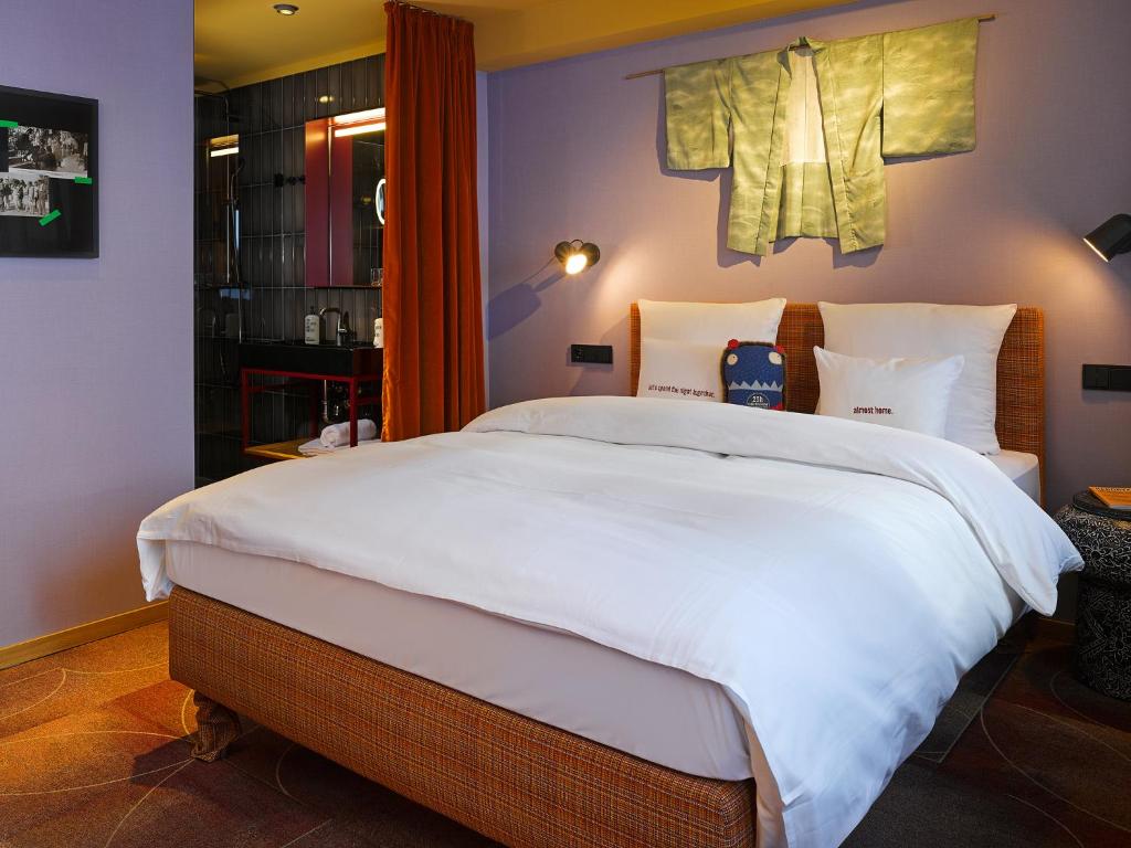 Cama ou camas em um quarto em 25hours Hotel The Trip