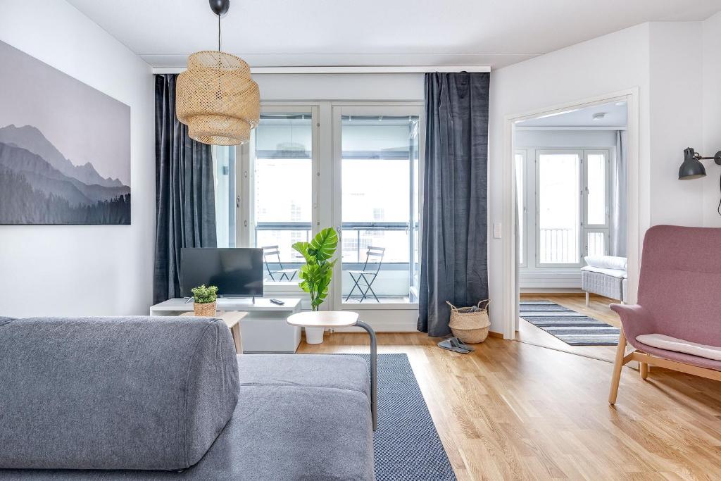 Haave Apartments Tampere tesisinde bir oturma alanı