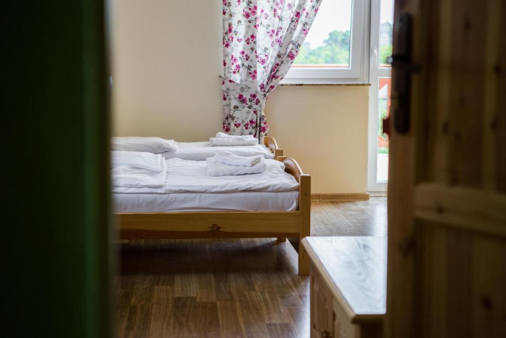 Posteľ alebo postele v izbe v ubytovaní Willa Wojtasówka