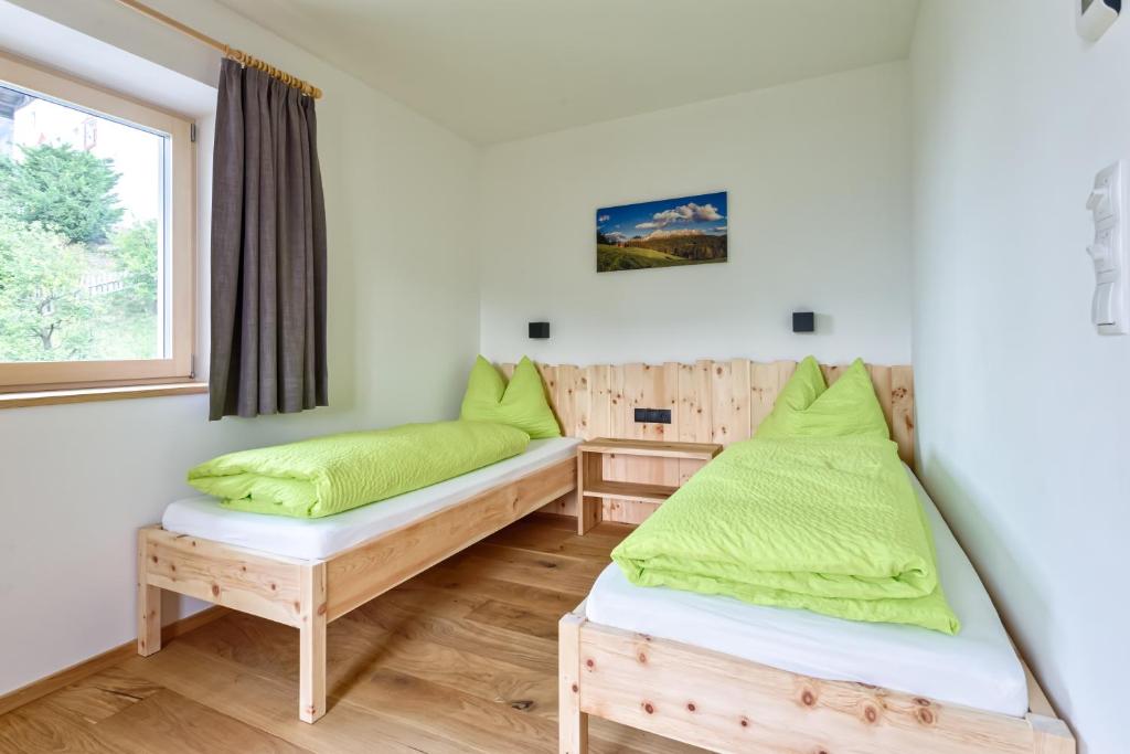 Postel nebo postele na pokoji v ubytování Frühaufhof