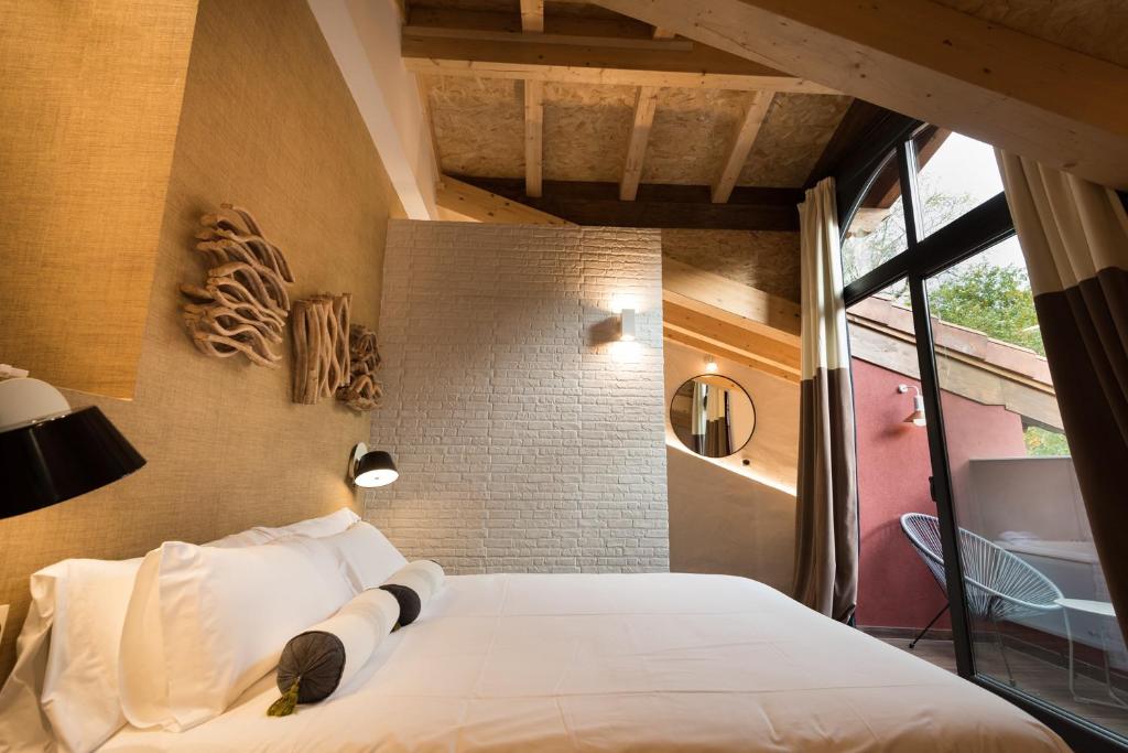 Postel nebo postele na pokoji v ubytování Hotel Rural Sagarlore