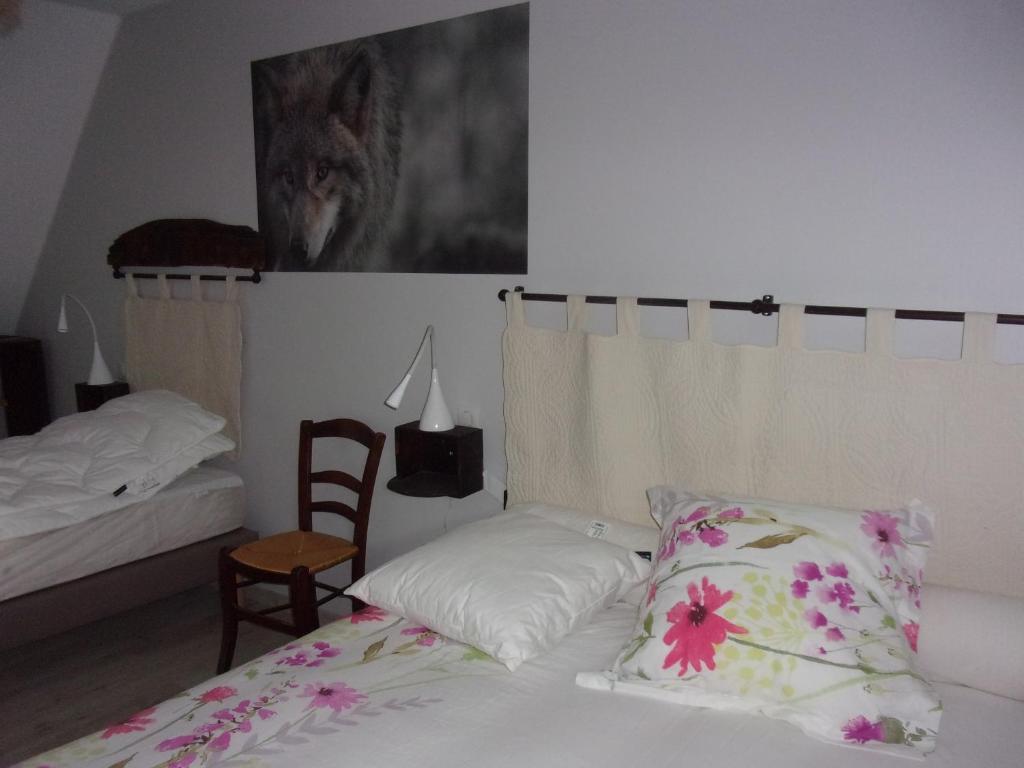 Postel nebo postele na pokoji v ubytování Chambre d'hôtes Le Cascadou