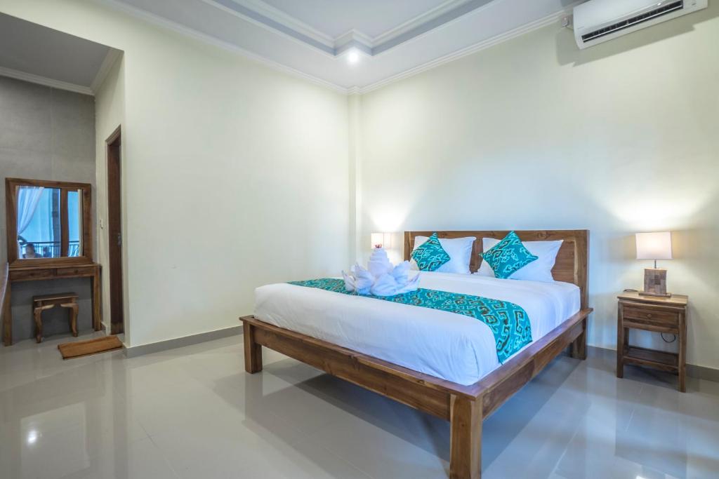 Letto o letti in una camera di Darba Guest House Ubud