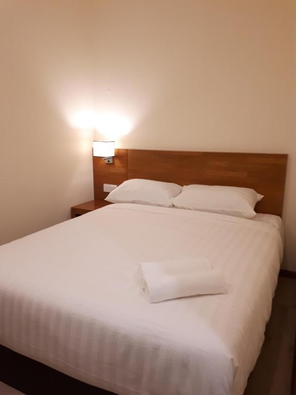 Postel nebo postele na pokoji v ubytování Hotin Inn